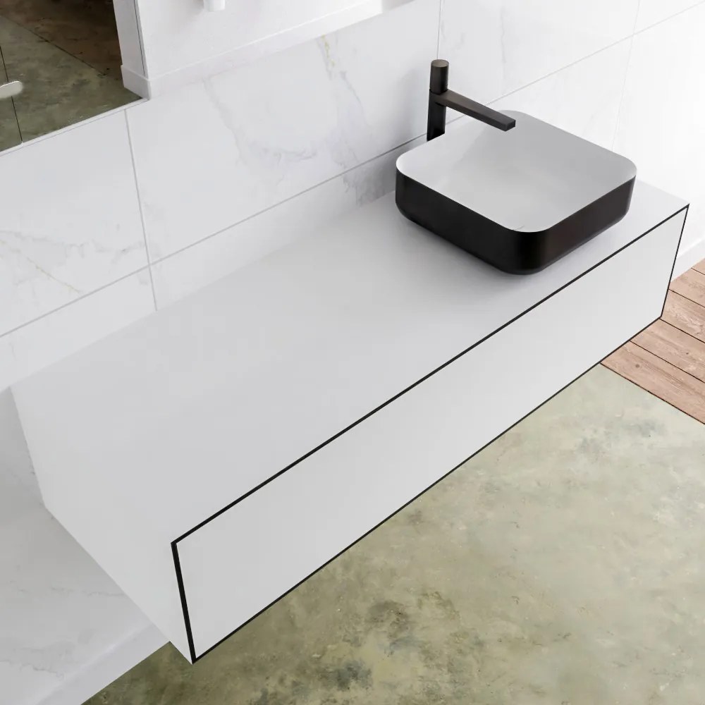 Zaro Lagom volledig naadloos solid surface onderkast met topblad 130cm mat zwart met 1 lades Push tot open. Compleet met solid surface opzetkom met 1 kraangat(en)