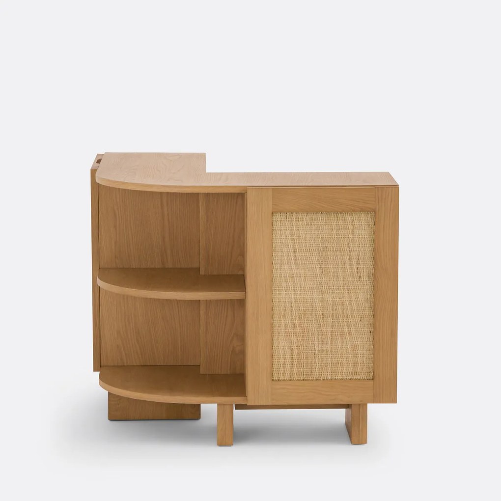 Boekenkast voor tegen de rugleuning van een bank in eikenhout met rotanfineer en riet, ARTY