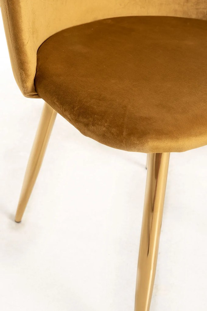 Vint fluwelen Gouden Stoel