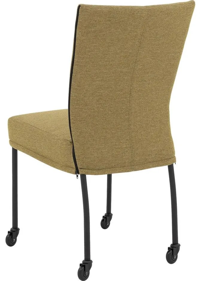 Goossens Eetkamerstoel Funk Zwarte Poten groen stof leuning en Zwart skater wiel met zwarte kapmet wielen, modern design