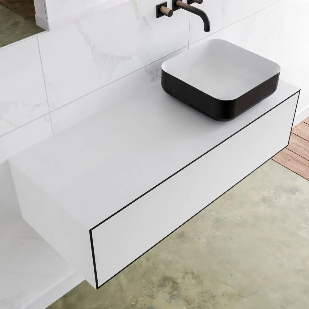 Zaro Lagom volledig naadloos solid surface onderkast met topblad 110cm mat zwart met 1 lades Push tot open. Compleet met solid surface opzetkom met 0 kraangat(en)