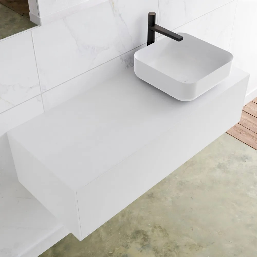 Zaro Lagom volledig naadloos solid surface onderkast met topblad 110cm mat wit met 1 lades Push tot open. Compleet met solid surface opzetkom met 1 kraangat(en)