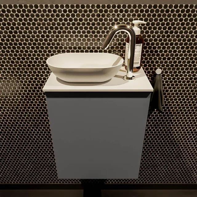 Mondiaz Fowy Toiletmeubel - 40x50x23cm - dark grey mat - 1 kraangat - wasbak links - 1 deur - solid surface - blad MDF - wasbak: Wit / Zwart FOWY59001darkgreytalc