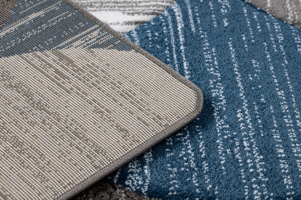 Tapijt ALTER Geo Schelpen blauw