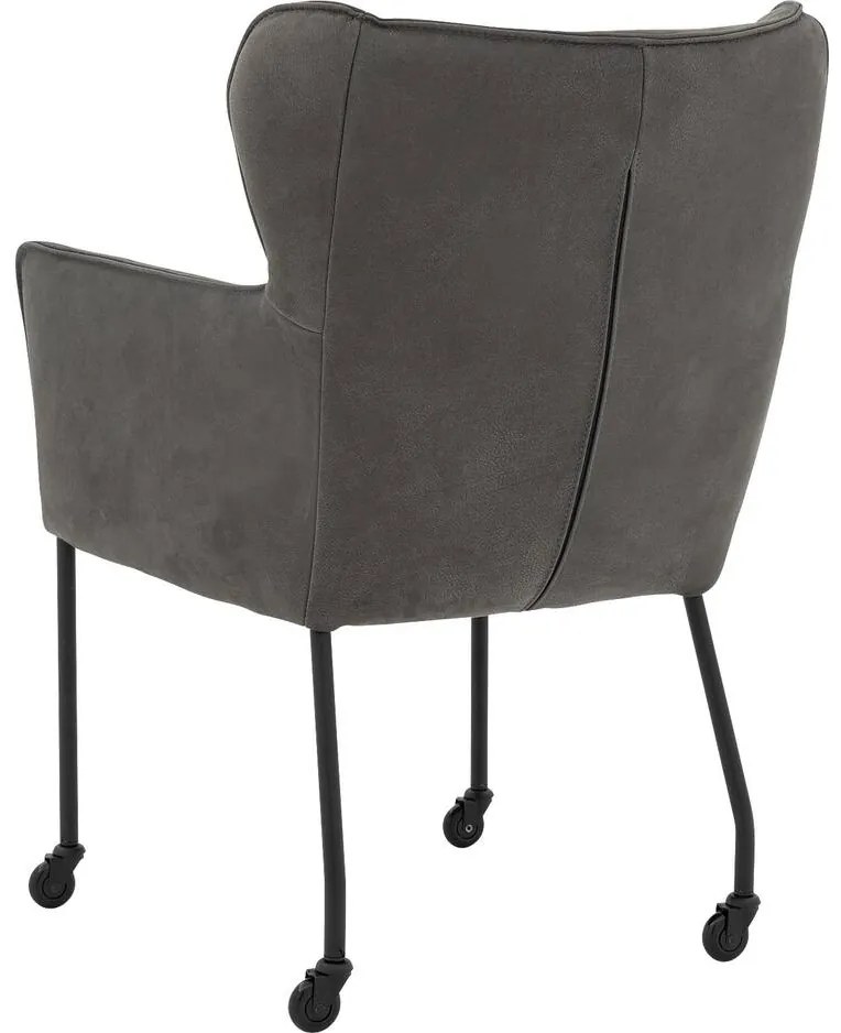 Goossens Excellent Eetkamerstoel Leogang zwart leer met armleuning en Zwart skater wiel met zwarte kapmet wielen, elegant chic