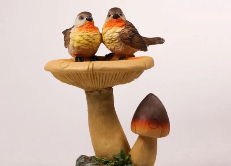 2 vogels op paddenstoel 22 cm