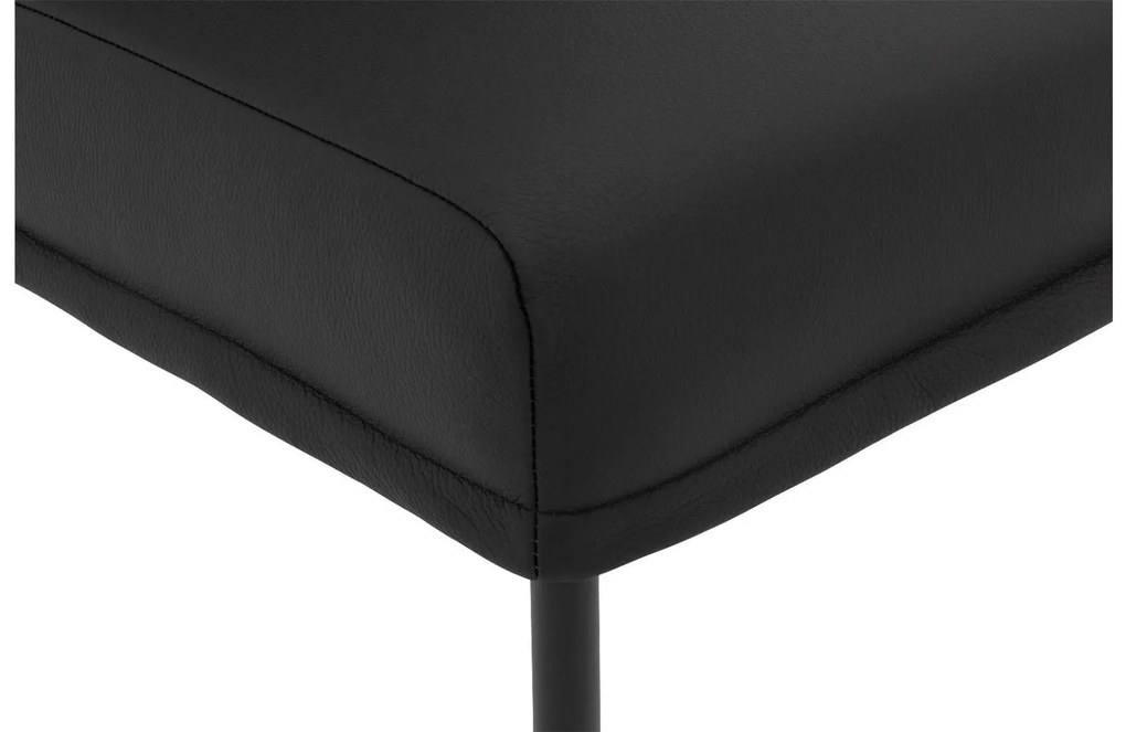 Goossens Eetkamerstoel Funk Zwarte Poten zwart leer leuning en Zwart skater wiel met zwarte kapmet wielen, modern design