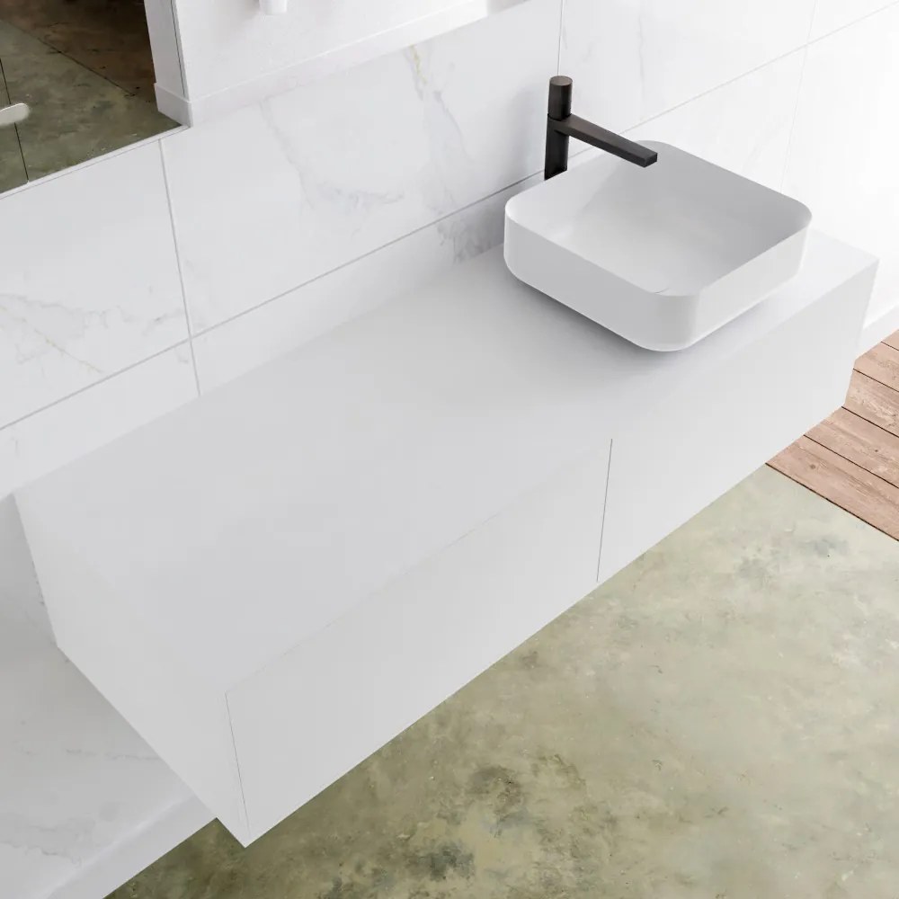 Zaro Lagom volledig naadloos solid surface onderkast met topblad 130cm mat wit met 2 lades Push tot open. Compleet met solid surface opzetkom met 1 kraangat(en)