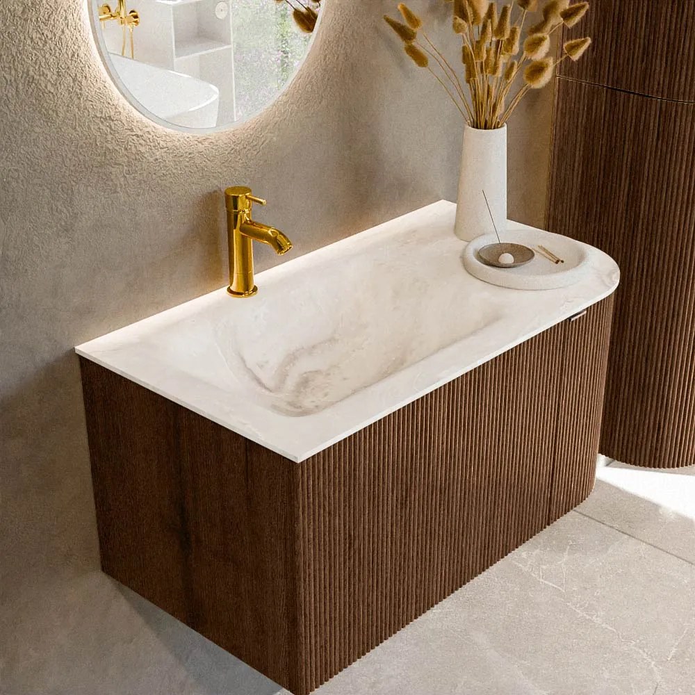 Mondiaz Kurve-dlux 85cm badmeubel ronding rechts walnut met 1 lade en deur en wastafel cloud kraangat links frappe
