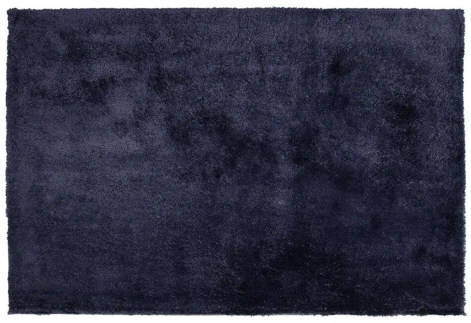 Vloerkleed donkerblauw 140 x 200 cm EVREN Beliani