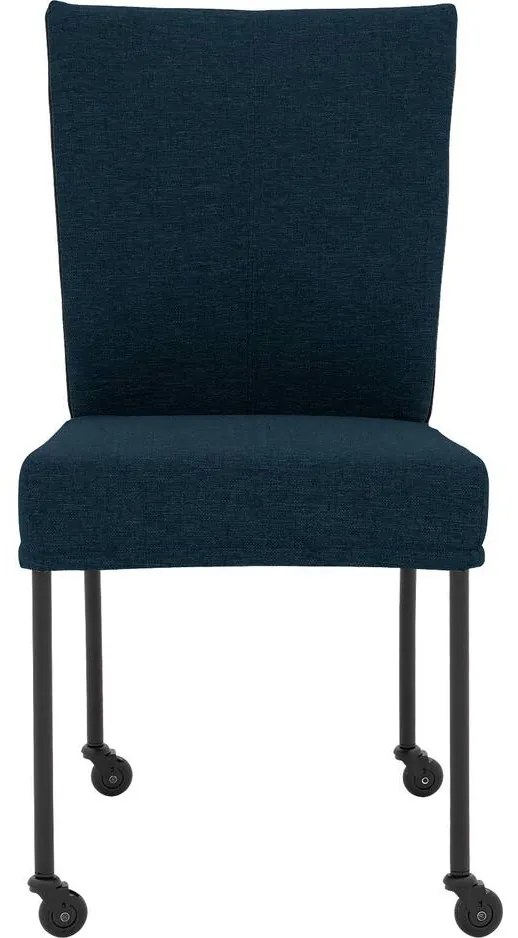 Goossens Eetkamerstoel Funk Zwarte Poten blauw stof leuning en Zwart skater wiel met zwarte kapmet wielen, modern design