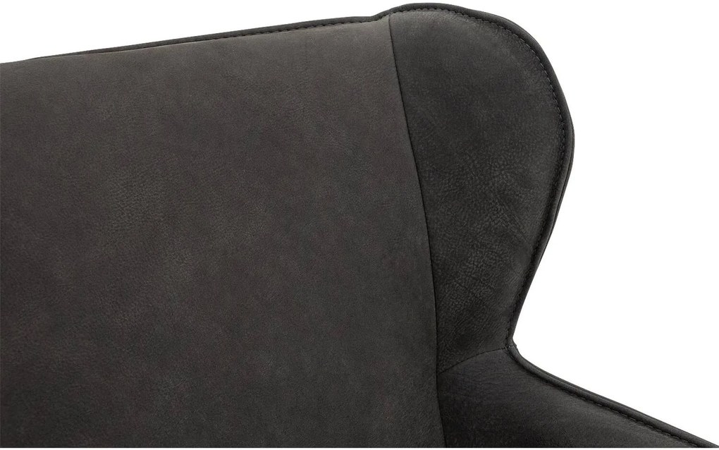 Goossens Excellent Eetkamerstoel Leogang zwart leer met armleuning en Zwart skater wiel met zwarte kapmet wielen, elegant chic