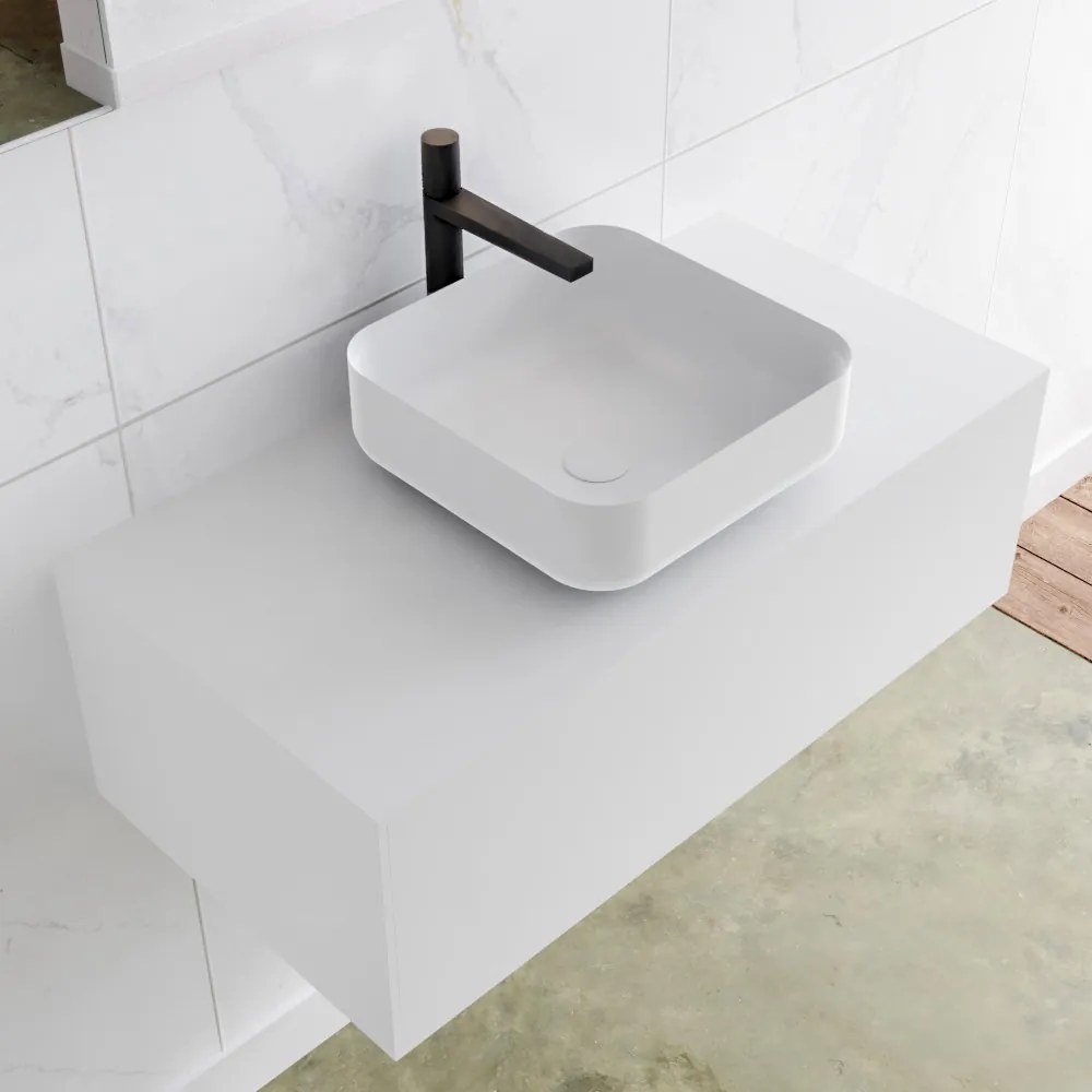 Zaro Lagom volledig naadloos solid surface onderkast met topblad 90cm mat wit met 1 lades Push tot open. Compleet met solid surface opzetkom met 1 kraangat(en)