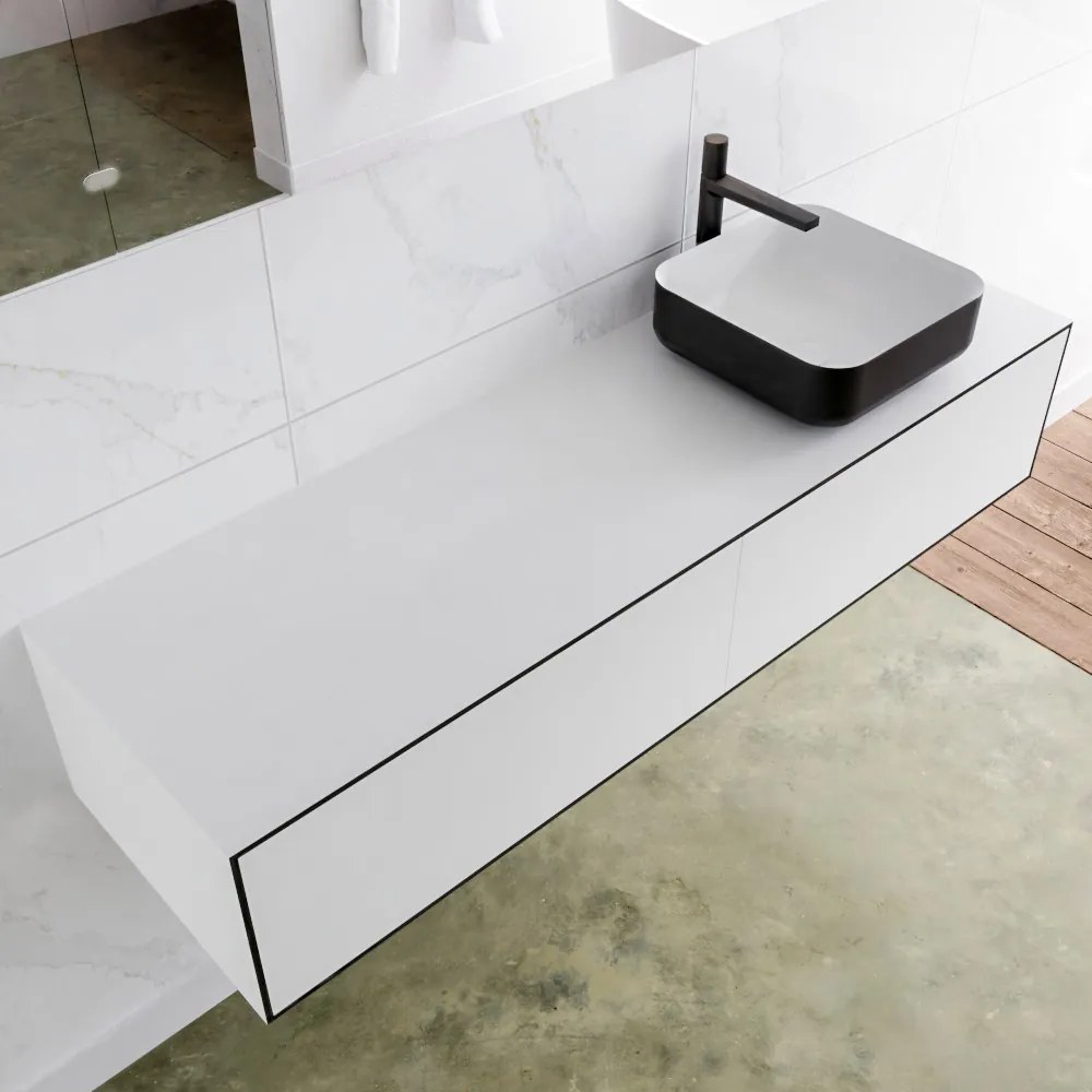 Zaro Lagom volledig naadloos solid surface onderkast met topblad 150cm mat zwart met 2 lades Push tot open. Compleet met solid surface opzetkom met 1 kraangat(en)