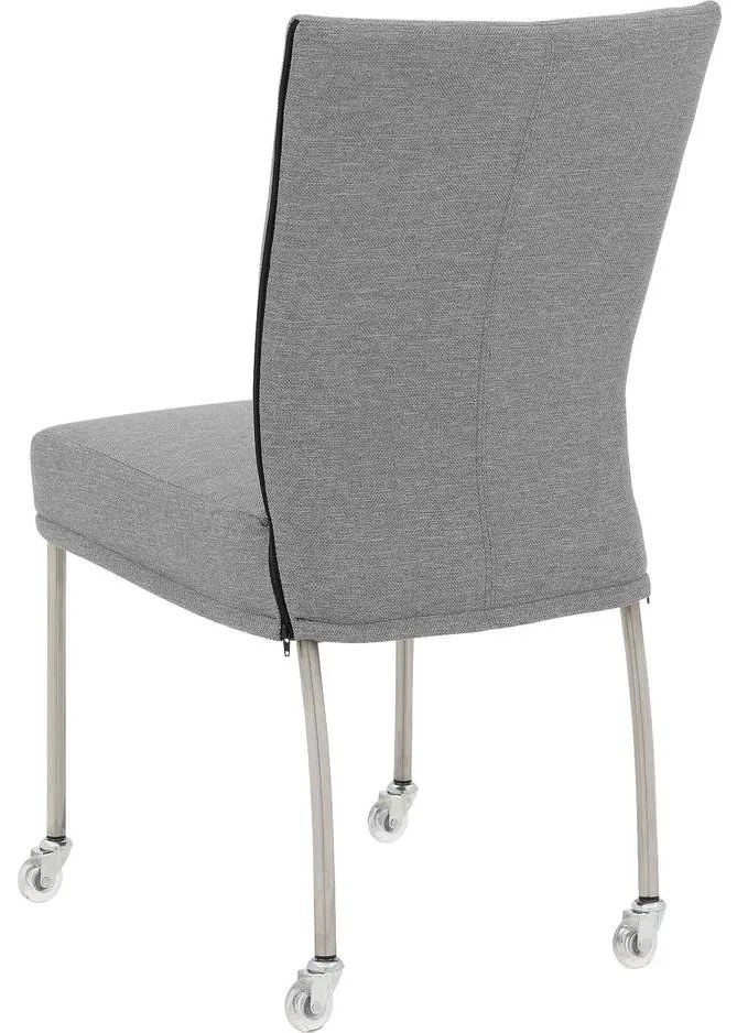 Goossens Eetkamerstoel Funk RVS Poten grijs stof leuning en Transparant skater wiel met rvs kapmet wielen, modern design