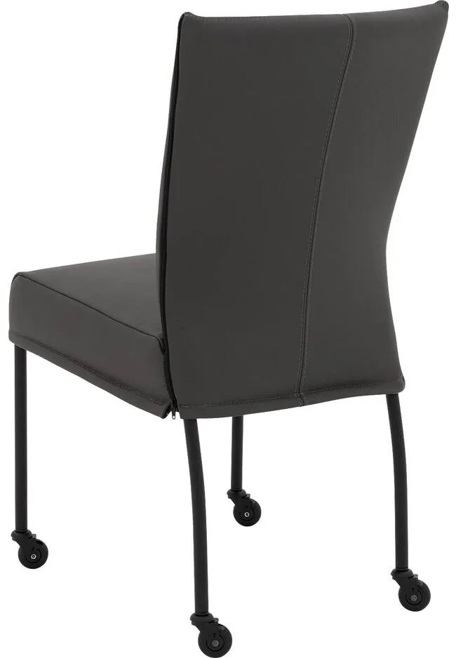 Goossens Eetkamerstoel Funk Zwarte Poten donkergrijs leer leuning en Zwart skater wiel met zwarte kapmet wielen, modern design