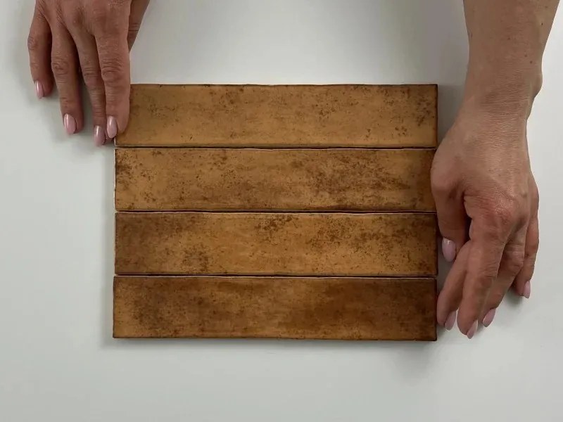 Jabo Kalon wandtegel terracotta 5x25cm glans