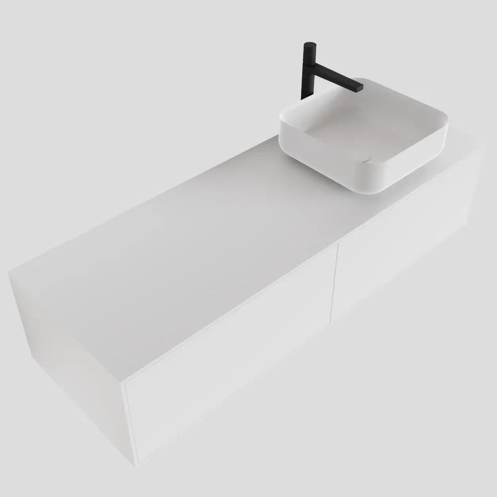 Zaro Lagom volledig naadloos solid surface onderkast met topblad 130cm mat wit met 2 lades Push tot open. Compleet met solid surface opzetkom met 1 kraangat(en)