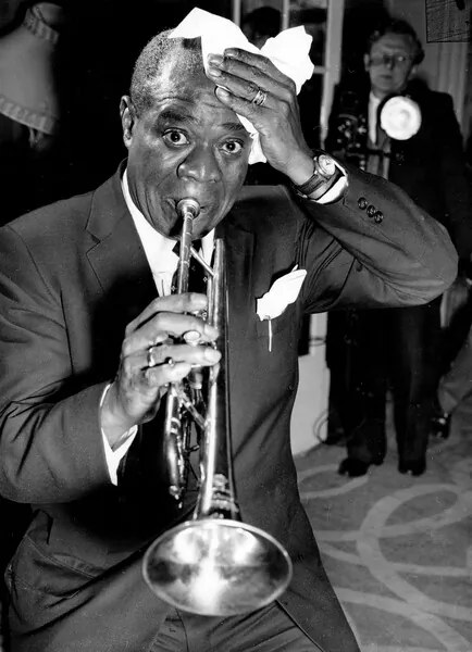 Foto Louis Armstrong during a conference at the Savoy Hotel, 1956