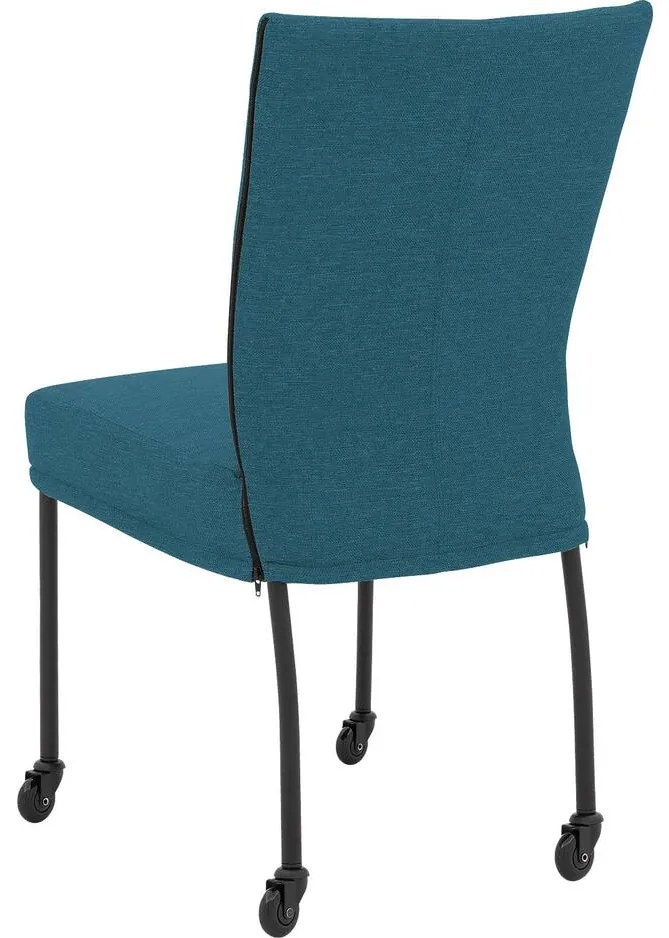 Goossens Eetkamerstoel Funk Zwarte Poten blauw stof leuning en Zwart skater wiel met zwarte kapmet wielen, modern design