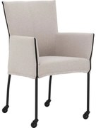 Goossens Eetkamerstoel Funk Zwarte Poten beige stof met armleuning en Zwart skater wiel met zwarte kapmet wielen, modern design