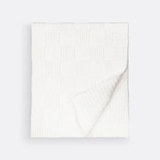 Plaid in tricot, Caneli