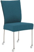Goossens Eetkamerstoel Funk RVS Poten blauw stof leuning en met wielenTransparant skater wiel met rvs kap, modern design