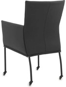 Goossens Eetkamerstoel Funk Zwarte Poten zwart leer met armleuning en met wielen, modern design