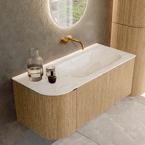 Mondiaz Kurve-dlux 105cm badmeubel ronding links oak met 1 lade en deur en wastafel big small rechts zonder kraangat ostra