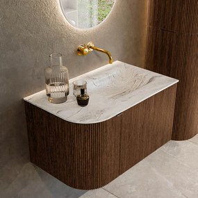 Mondiaz Kurve-dlux 75cm badmeubel ronding links walnut met 1 lade en deur en wastafel grunne rechts zonder kraangat glace