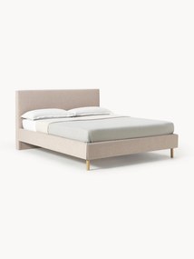 Gestoffeerd bed Giulia met houten poten