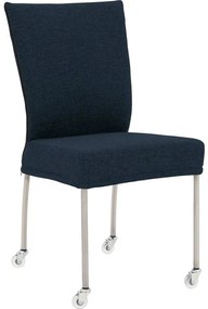 Goossens Eetkamerstoel Funk RVS Poten blauw stof leuning en Transparant skater wiel met rvs kapmet wielen, modern design