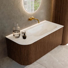 Mondiaz Kurve-dlux 105cm badmeubel ronding links walnut met 1 lade en deur en wastafel big small rechts zonder kraangat ostra