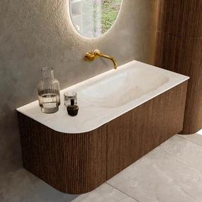 Mondiaz Kurve-dlux 105cm badmeubel ronding links walnut met 1 lade en deur en wastafel big small rechts zonder kraangat ostra