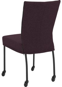 Goossens Eetkamerstoel Funk Zwarte Poten roze stof leuning en met wielenZwart skater wiel met zwarte kap, modern design