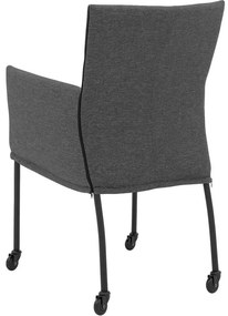 Goossens Eetkamerstoel Funk Zwarte Poten donkergrijs stof met armleuning en met wielenZwart skater wiel met zwarte kap, modern design