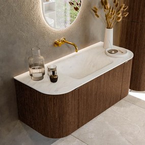 Mondiaz Kurve-dlux 110cm badmeubel ronding links/rechts walnut met 1 lade en 2 deuren en wastafel cloud midden zonder kraangat opalo