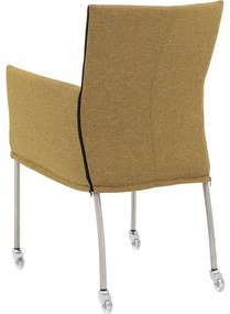 Goossens Eetkamerstoel Funk RVS Poten groen stof met armleuning en met wielenTransparant skater wiel met rvs kap, modern design