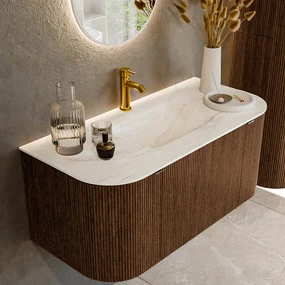 Mondiaz Kurve-dlux 100cm badmeubel ronding links/rechts walnut met 1 lade en 2 deuren en wastafel grunne midden 1 kraangat ostra