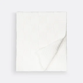Plaid in tricot, Caneli