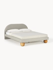 Gestoffeerd bed Rena met eikenhouten bolpoten