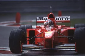 Foto Michael Schumacher in a Ferrari F310B at the Belgian GP, Spa Francorchamps, Belgium, 1997