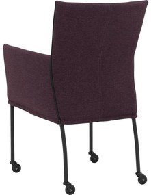 Goossens Eetkamerstoel Funk Zwarte Poten roze stof met armleuning en met wielenZwart skater wiel met zwarte kap, modern design