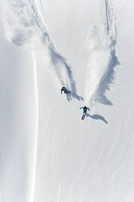 Foto Aerial view of two skiers skiing, Creativaimage, (26.7 x 40 cm)