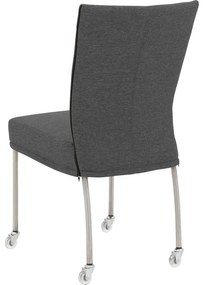Goossens Eetkamerstoel Funk RVS Poten donkergrijs stof leuning en met wielenTransparant skater wiel met rvs kap, modern design