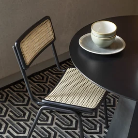 Zuiver Jort Retro Stoel Met Rotan Zwart