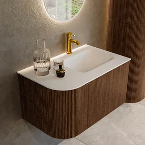Mondiaz Kurve 75cm badmeubel ronding links walnut met 1 lade en deur en wastafel grunne kraangat rechts