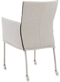 Goossens Eetkamerstoel Funk RVS Poten lichtgrijs stof met armleuning en met wielenTransparant skater wiel met rvs kap, modern design