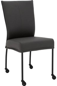 Goossens Eetkamerstoel Funk Zwarte Poten donkergrijs leer leuning en Zwart skater wiel met zwarte kapmet wielen, modern design