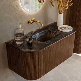 Mondiaz Kurve-dlux 100cm badmeubel ronding links/rechts walnut met 1 lade en 2 deuren en wastafel grunne midden zonder kraangat lava